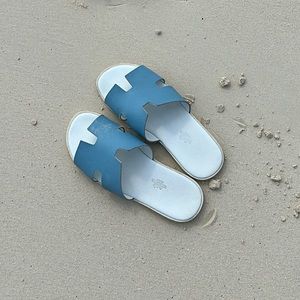 Blue men’s Hermes sandals